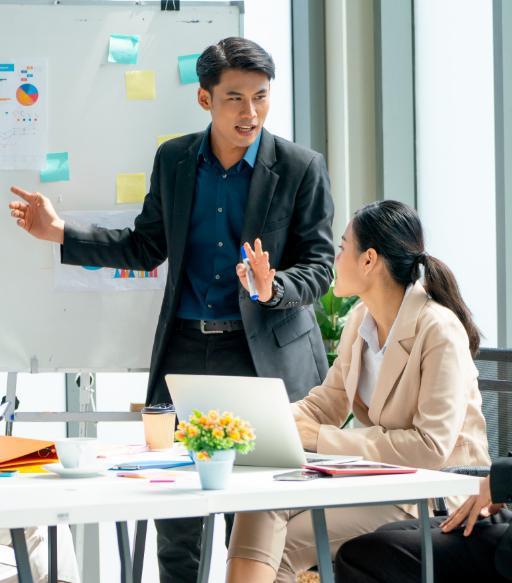 asian business man present the project on whiteboard asian business man present the project on whiteboard